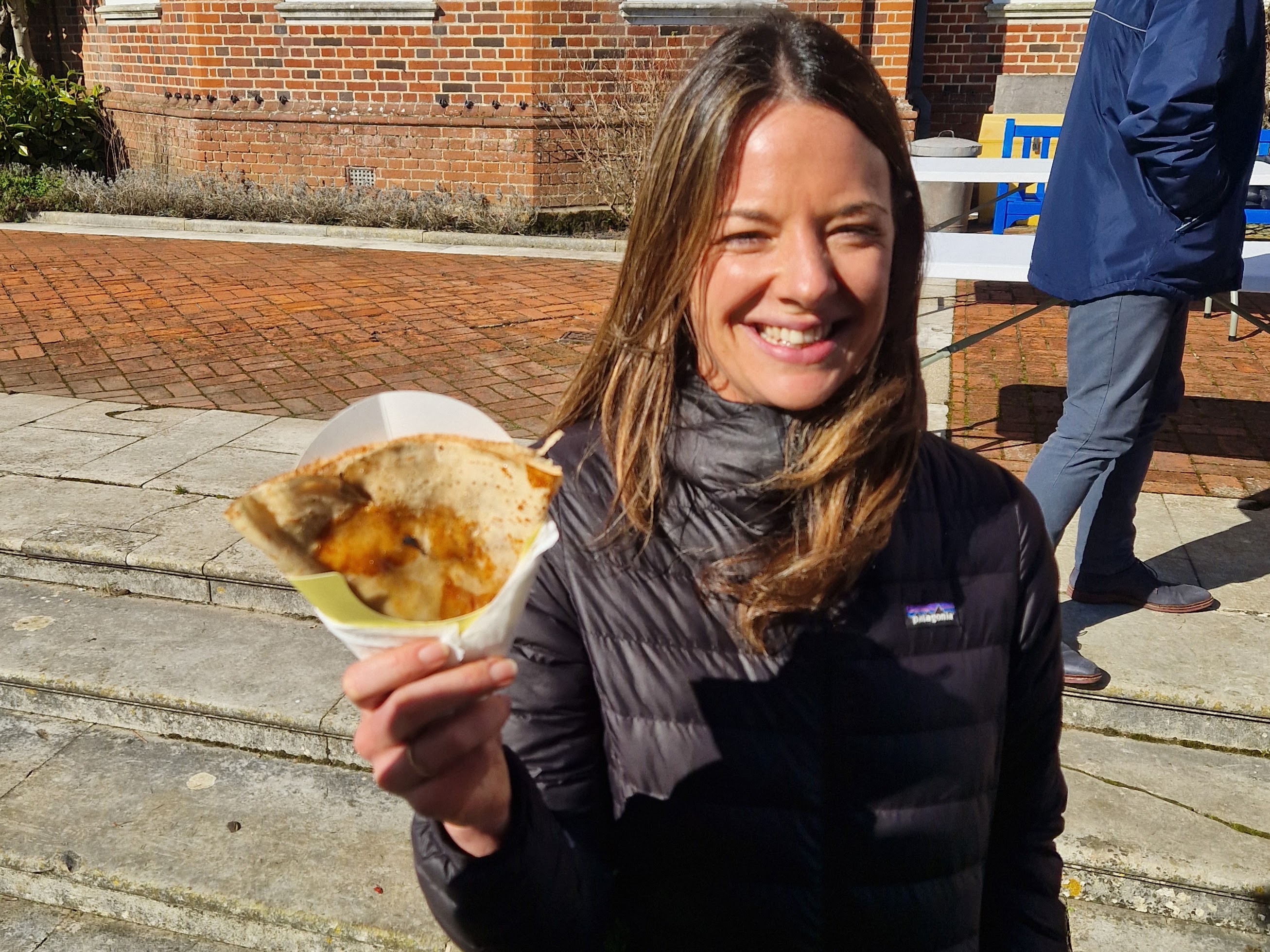 Guest enjoying a freshly prepared Eden Crepe